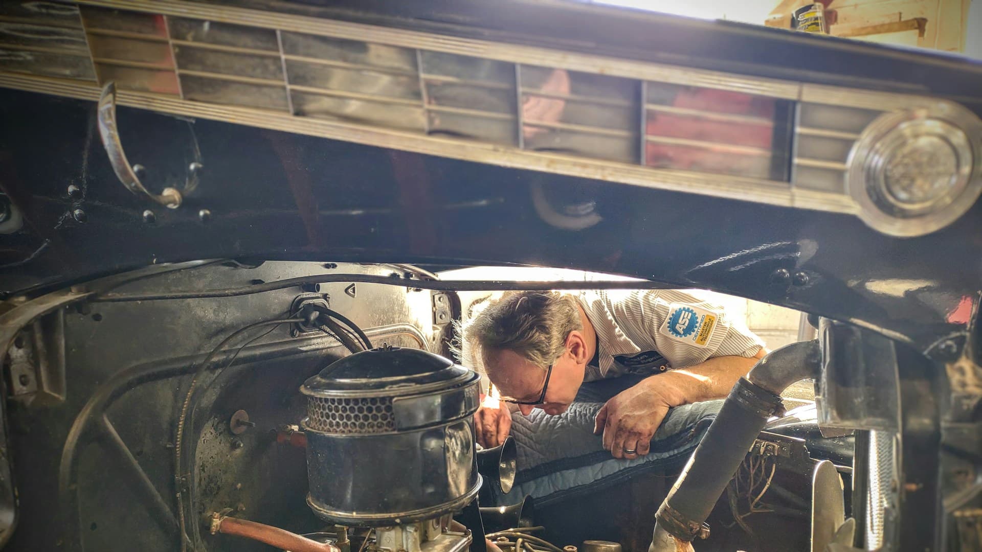 Professional mechanic working on car engine - KnA mobilemechanic